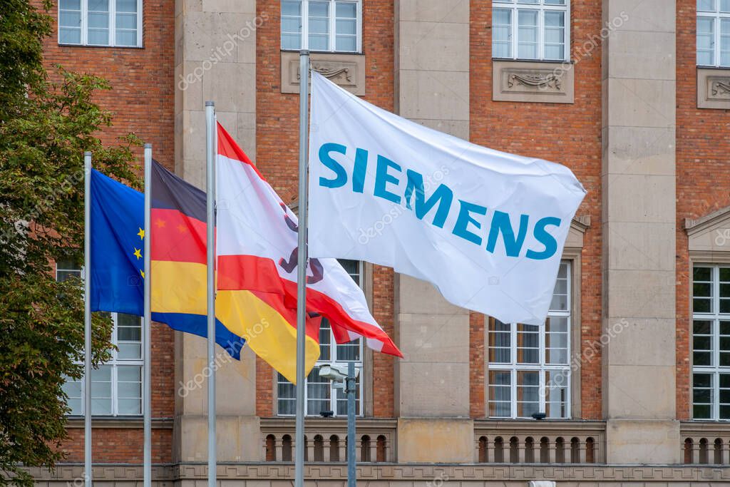 Siemens flag, office German Siemens AG, technology company focused on industry, infrastructure, transport and healthcare in Berlin, Germany - August 20, 2024