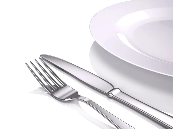 Empty plate, Fork and knife Royalty Free Stock Images