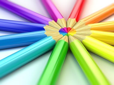 Beyaz arkaplanda renkli kalemler