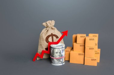 Kırmızı oklu kutular ve para. Ticaret hacmindeki artış, alım gücünün artması. Ticaret fazlası, ekonomik gelişme. Ücretler, gümrük vergileri. Yüksek satışlar. İthalat ve ihracat. Eklenen değer