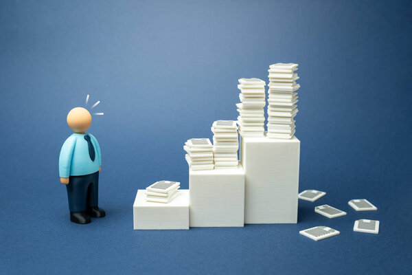 Офисный работник поражен накопленной бумажной работой. Бюрократия и неэффективная организация работы и отчетности. Перегрузка офиса и административная неэффективность. Стресс на рабочем месте