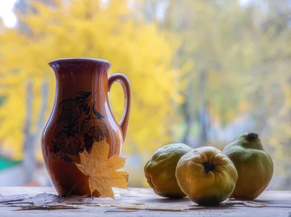 Autumn still life with fruits outdoors