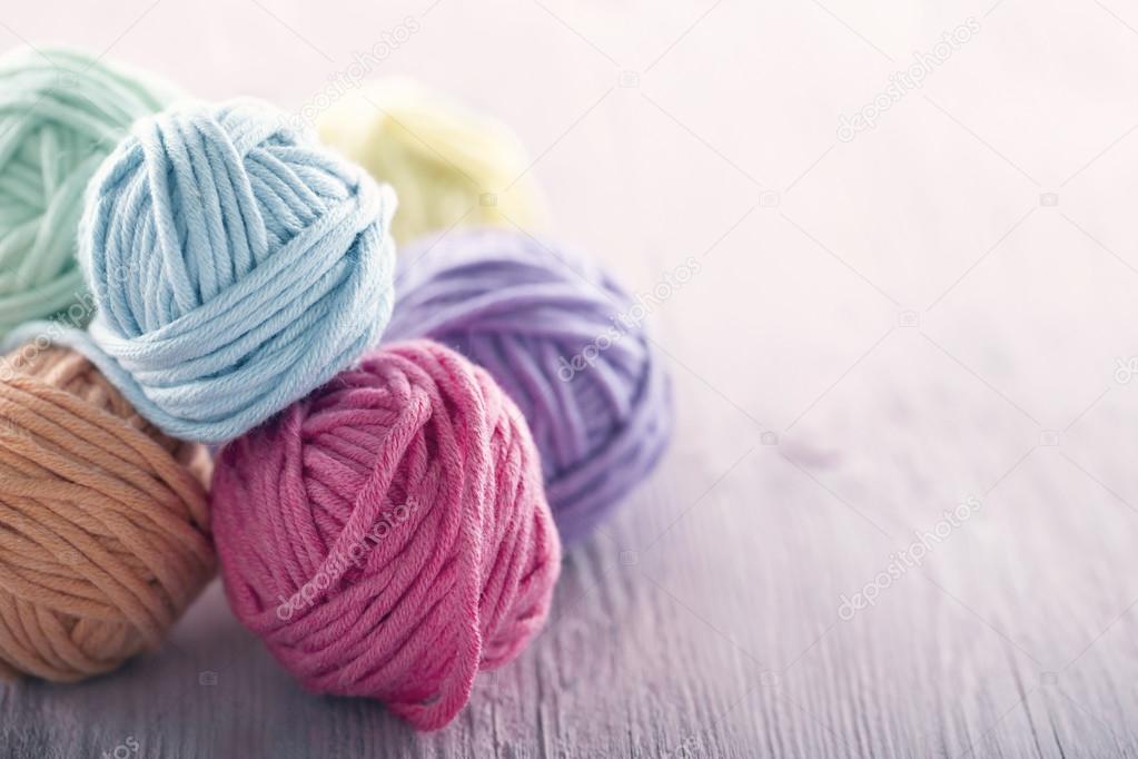 Pastel yarn balls Stock Photo by ©anskuw 105010864