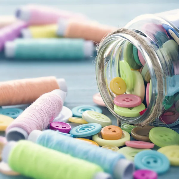 Multicolored buttons and spools of thread4 — Stock Photo, Image