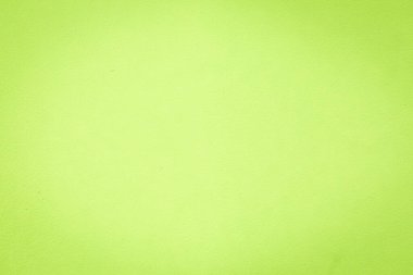 Duvarın arka planı parlak trend renginde 2021 yılının Yu rengini aydınlatıyor. Sarı çimento boyalı