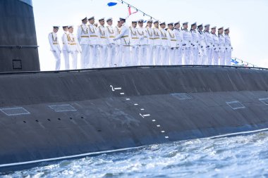 July 21, 2021, Russia, Kronstadt. The crew of the diesel-electric submarine Dmitrov b-806 on the raid before parade clipart