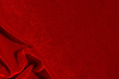  Buruşuk kadife kumaş dokusu güneşte parlıyor.