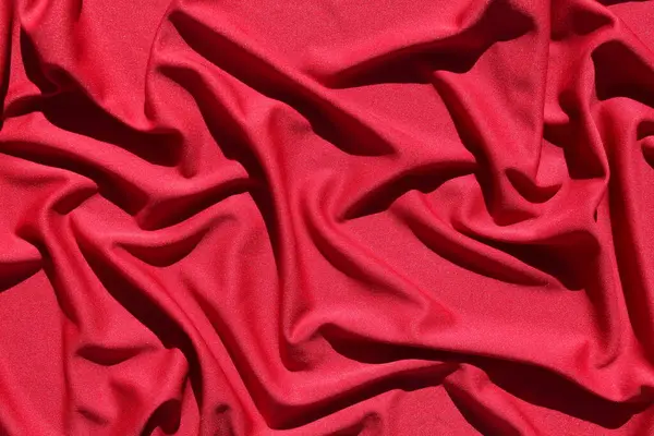 Textura Tela Roja Presenta Superficie Con Pliegues Con Una Sombra —  Fotos de Stock