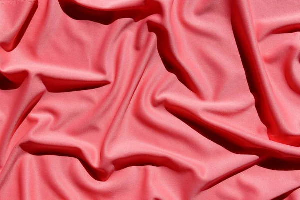 Textura Tecido Drapeado Uma Superfície Rosa — Fotografia de Stock