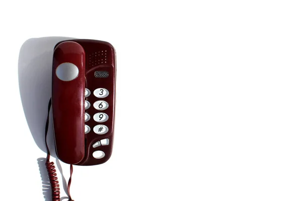 Bourgogne Fasta Telefon Står Vit Bakgrund — Stockfoto