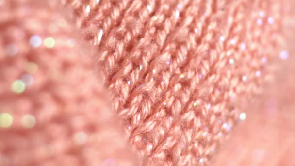 Fond textile - tissu en laine et synthétiques pour un pull rose. Macro curseur — Video