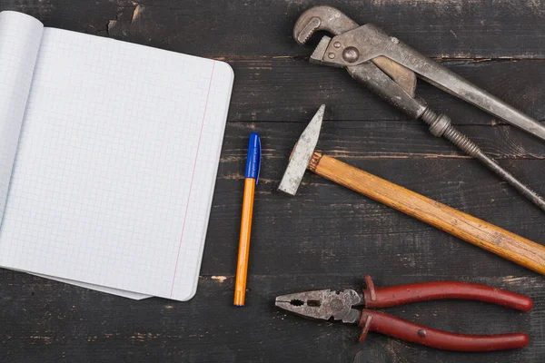 Set Hand Tools Repair Top View Wooden Background Notebook Writing — Stock Photo, Image