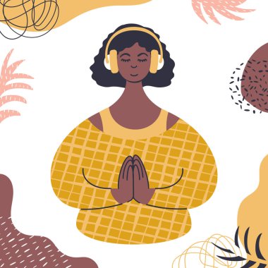 Ses güdümlü meditasyon. Kulaklıkla rahatlayan Afrikalı genç bir kadın..