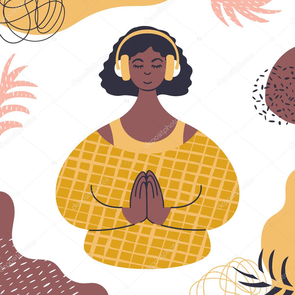 Audio guided meditation. Young african woman relaxing in headphones.