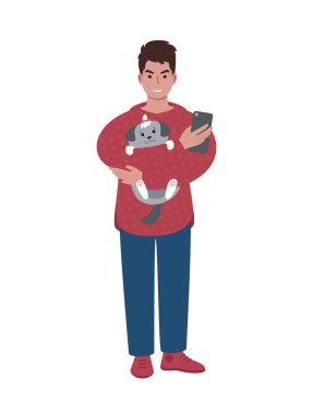 Evcil köpeği ve cep telefonu olan genç beyaz bir adam..