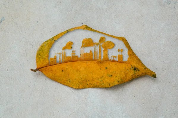 Şehir binası kuru yaprak kesiyor. Şehir ve sanayi fabrikaları dünya üzerinde büyüyor. Endüstriyel zehirli duman çevreyi yok eder. Dünyayı yeşil doğal ekolojiden kurtar..