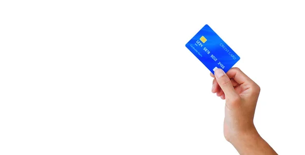 手札はクリッピングパス付きの白い背景に青のクレジットカードを持ってる Eコマース技術でオンラインで買い物をすると ストック画像
