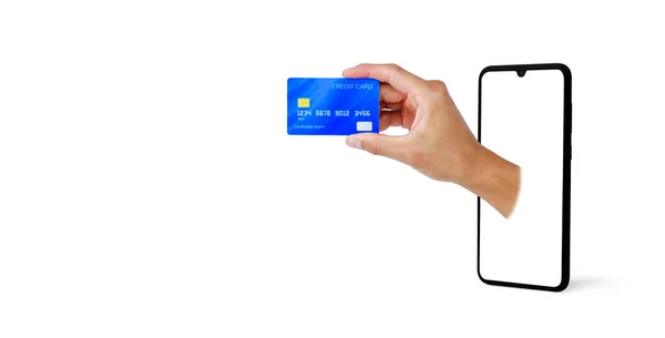 クリッピングパスのついた白い背景のスマートフォンからクレジットカードを手に入れます Eコマース技術でオンラインで買い物をすると ストック写真