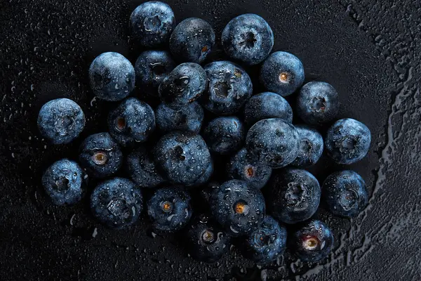 Φρέσκο φυσικό αντιοξειδωτικό blueberries σωρό, μακροεντολή — Φωτογραφία Αρχείου