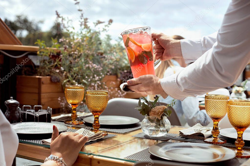 couple having amazing lunch at outdoor restaurant