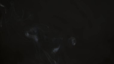 Metin veya tasarım için bulanık arkaplan. Bulanık soyut duman deseni. Tek renkli bir resim. Siyah ve beyaz soyut tasarım.