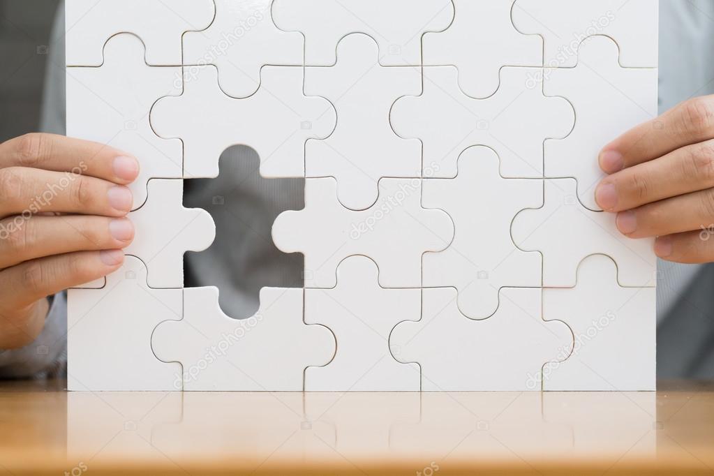 Missing jigsaw puzzle piece. Search successful business concept