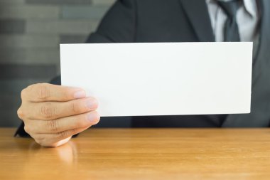 El işadamı gösteren beyaz kağıt