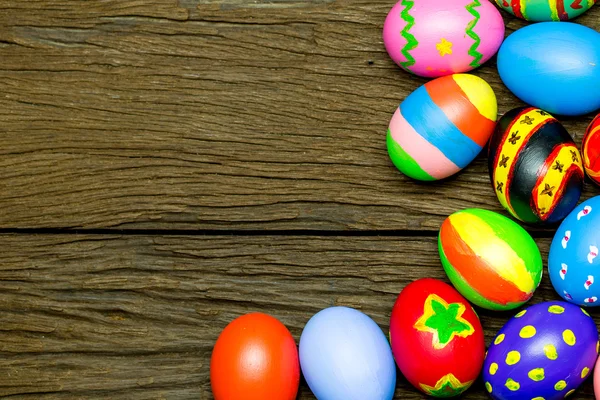 Easter eggs on wood background — Stockfoto