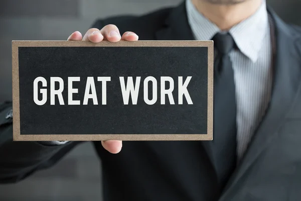 Tolle Arbeit, Botschaft auf Tafel und Griff des Geschäftsmannes — Stockfoto