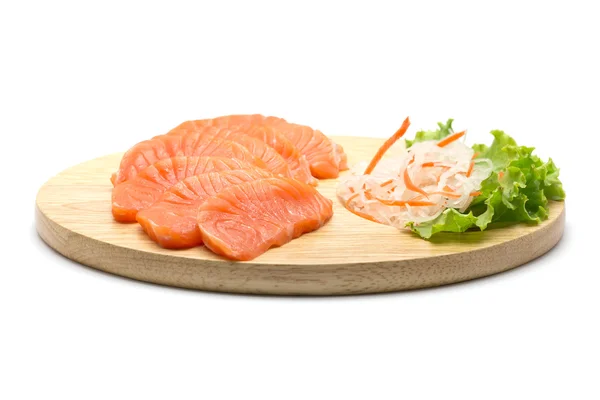 Gesneden zalm op houten achtergrond — Stockfoto