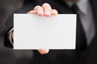 El işadamı gösteren beyaz kağıt