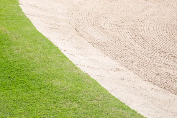 Sand och gräs på golfbanan — Stockfoto