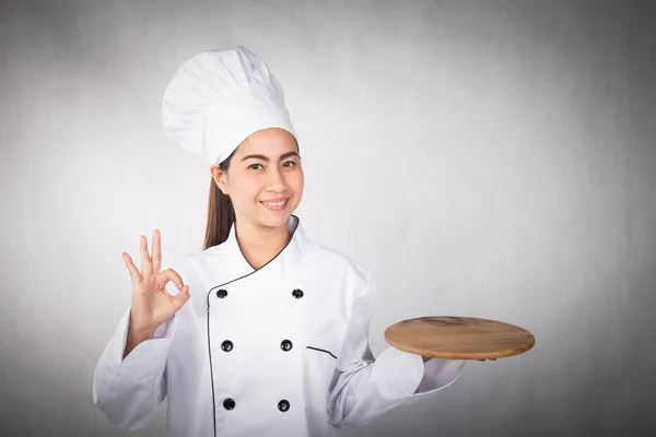 Mujer chef mostrando y presentando — Foto de Stock