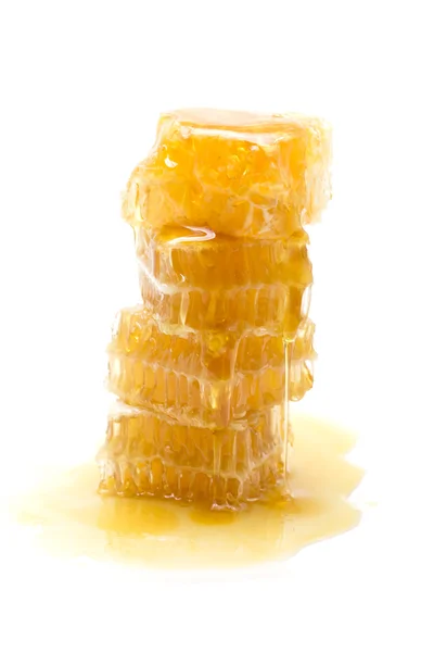 Honingraat op witte achtergrond — Stockfoto