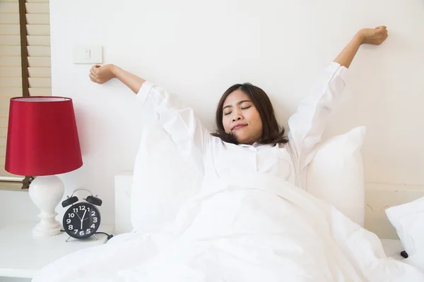 Young asian woman stretching in the morning — Stock Photo, Image