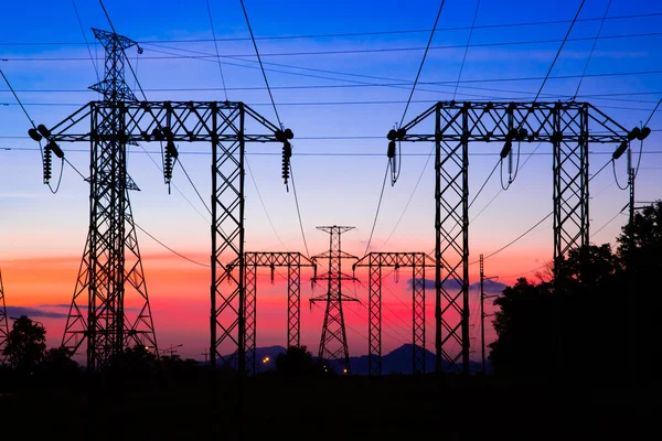 High voltage post and sky in twilight time — Stock Photo, Image