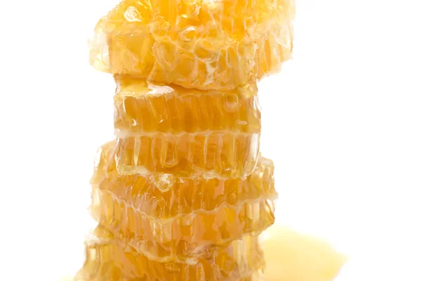 Favo de mel no fundo branco — Fotografia de Stock