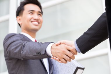 Asya işadamı yüzü gülen ile karşılıklı yapma