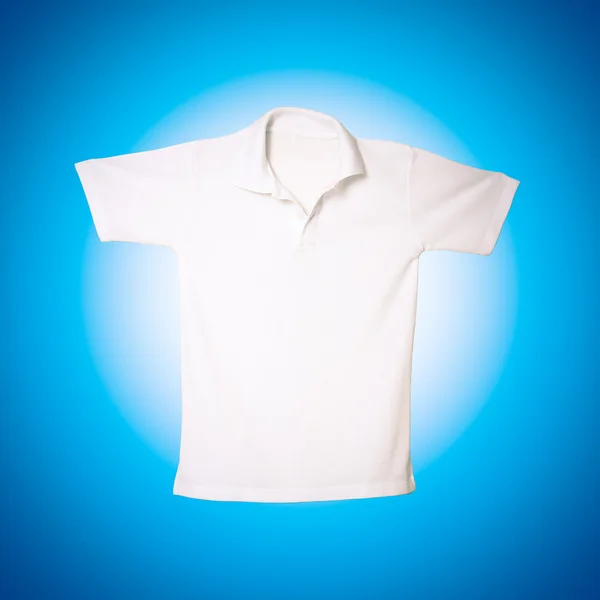 White polo shirt on blue background — Stock Photo, Image