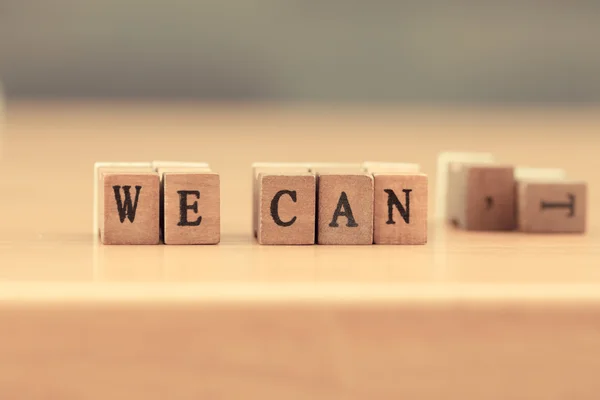 We can. word written on wood block, vintage retro color tone — Stock Photo, Image