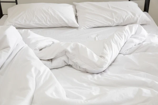 View of an unmade bed — Stock Photo, Image