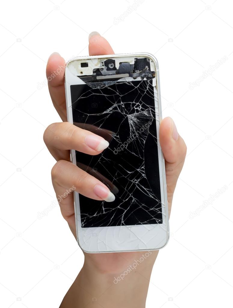Woman hand holding mobile smartphone with broken screen