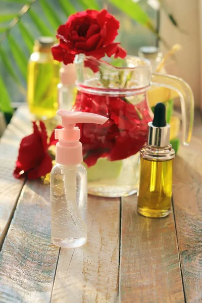 Fresh Roses Spray Bottles Aromatic Oil Wooden Table Natural Home — Stock Photo, Image