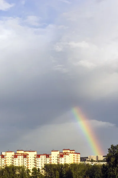 Rainbow in the city sky — Stock Photo, Image