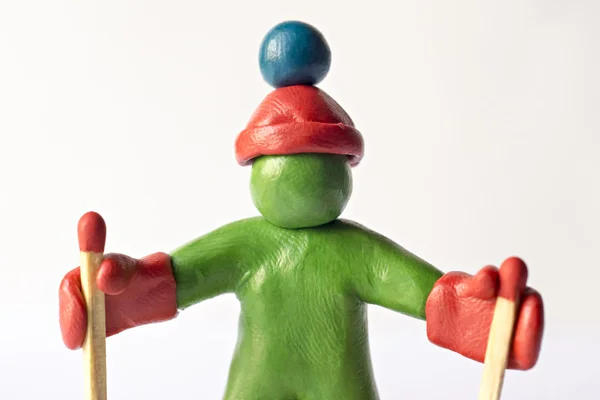 Green skier from plasticine — Stock Photo, Image