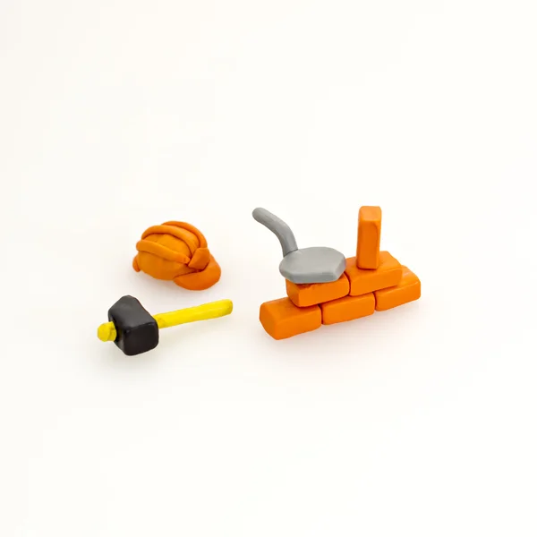 Construction tools and wall from red bricks — Stock Photo, Image