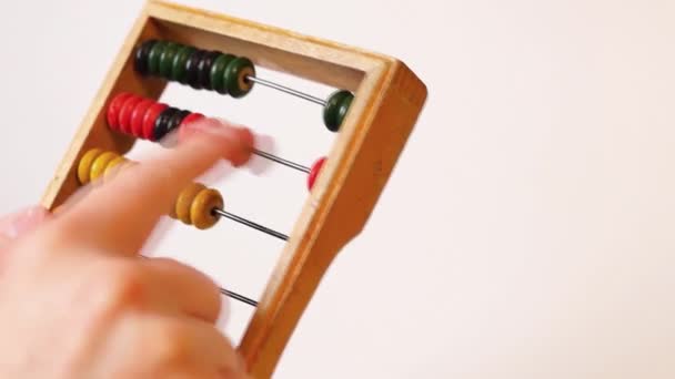 Hands calculate on abacus — Stock Video