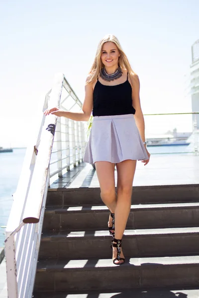 Blonde Female Walking Down Stairs -Outside — Stock Photo, Image