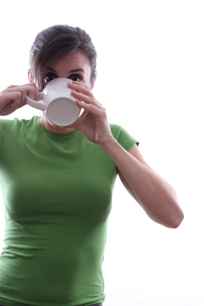Female drinking out of a mug — Stock Photo, Image