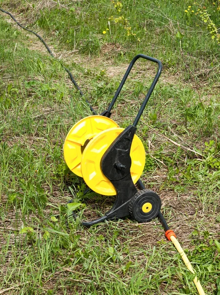 Garden hose with coil — Stock Photo, Image